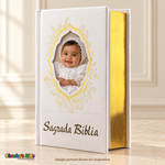 Small Spanish Holy Bible with white hardcover and gold-tone details, with a sample portrait and reflective page edges