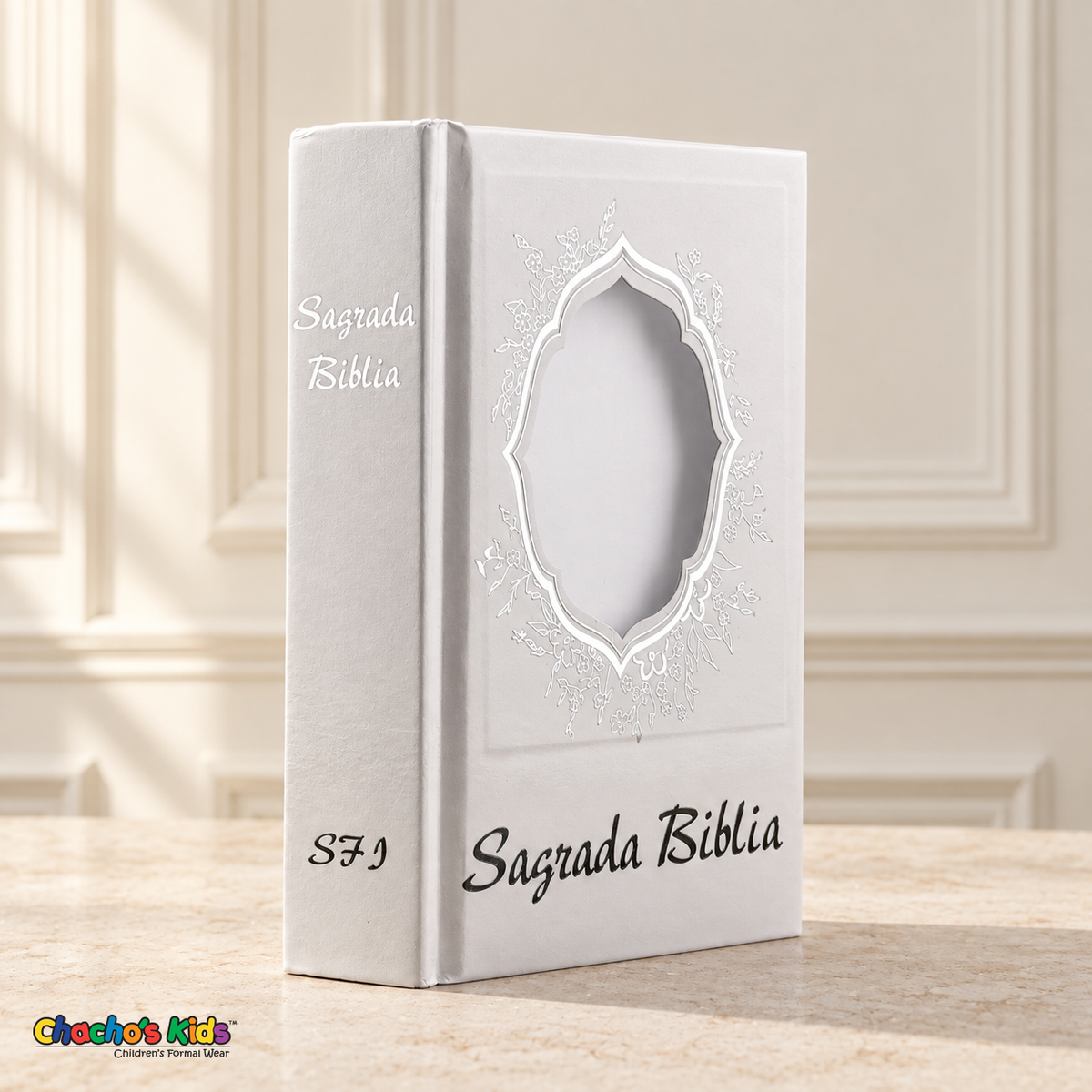 Small Spanish Holy Bible with white hardcover and silver-tone details, showing the blank ornate photo window