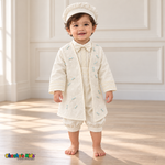 Tony ivory five-piece boys baptism outfit, three quarter front with embroidered coat and lace trim