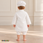 Tony white boys baptism outfit, back view showing plain long coat, lace-trimmed cuffs and matching cap