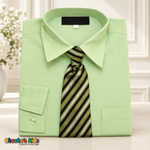 Classic pastel green dress shirt neatly folded with its coordinating patterned tie