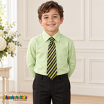 Boy wearing a classic pastel green long-sleeve dress shirt with its coordinating patterned tie and black dress pants
