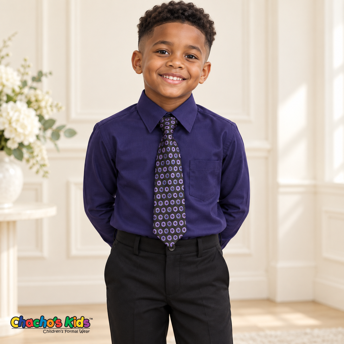 Boy wearing a classic purple long-sleeve dress shirt with its coordinating patterned tie and black dress pants