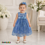Baby girl wearing baby blue embroidered lace and tulle dress style D-1560 | Chacho's Kids