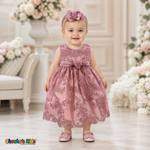 Baby girl wearing dusty rose embroidered lace and tulle dress style D-1560 | Chacho's Kids