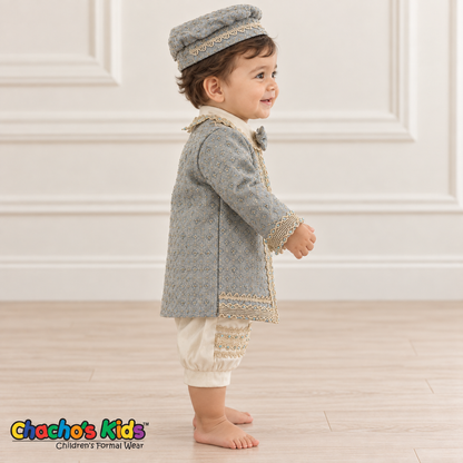 Dorian-Prince Baptism Outfit in ivory and muted blue with gold-tone trim, baby model side view with coat.