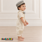 Dorian-Prince Baptism Outfit in ivory and muted blue with gold-tone trim, baby model side view without coat.