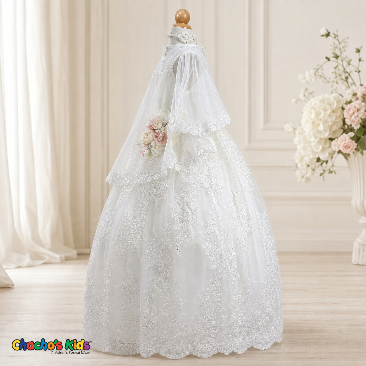 Girls white Virgin Mary baptism dress with floral sash, side view