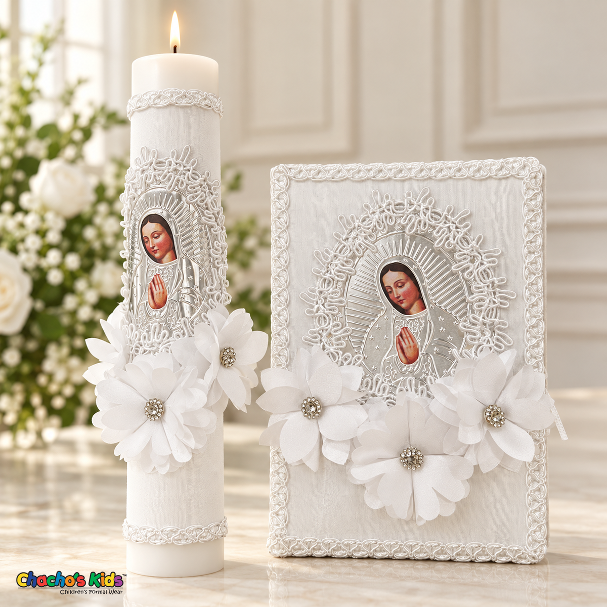 Silver Virgin Mary candle and book with white flowers and rhinestone centers