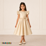 Girl wearing champagne satin flower girl dress with bow, flutter sleeves and full skirt