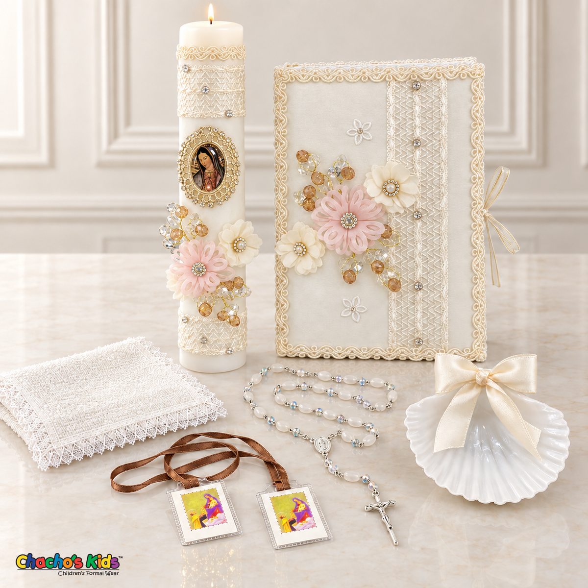 Girls blush and ivory Virgin Mary baptism set with lit candle, floral book, shell, rosary, scapular and lace-edged cloth